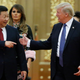 President Donald Trump and Chinese President Xi Jinping arrive at a state dinner at the Great Hall of the People on Nov. 9, 2017, in Beijing. (Thomas Peter/Pool/Getty Images)